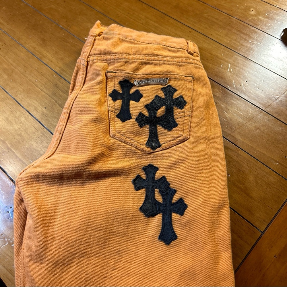 Chrome Hearts Orange Jeans with Black Cross Accents